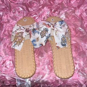 Never worn Slides with a clothes bow